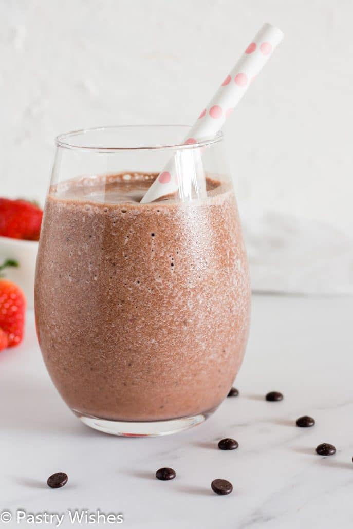 strawberry banana chocolate smoothie in a glass