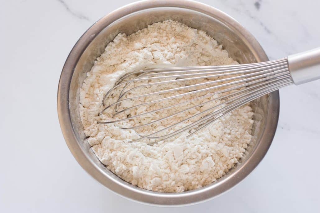 Whisking flour, cornstarch, baking powder and salt in a mixing bowl.