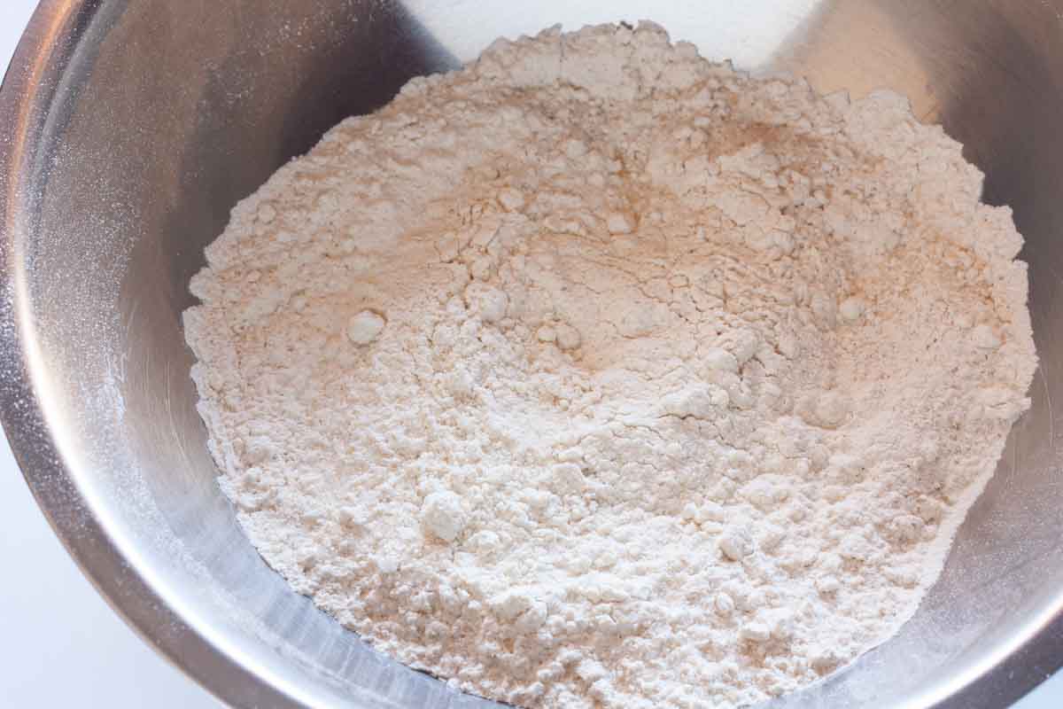 Sifted flour, baking powder, baking soda, sugar and salt in a large mixing bowl.