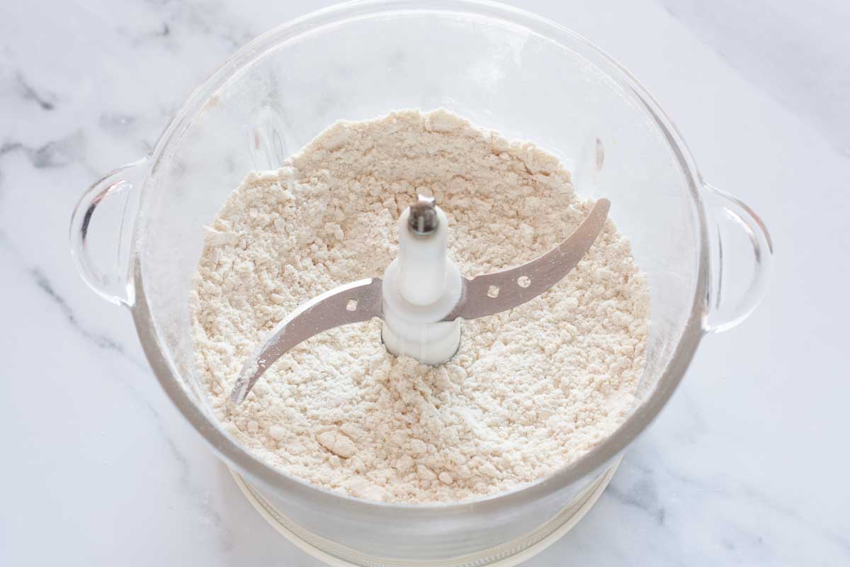 Flour, sugar and salt in a food processor.