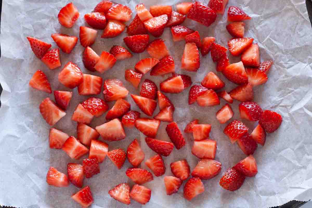 Diced strawberries on parchment paper.