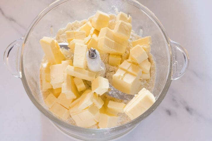 Flour, salt and cubes of butter in a food processor.