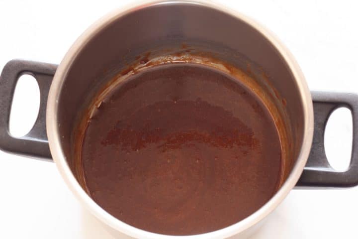 Bourbon caramel in a saucepan.