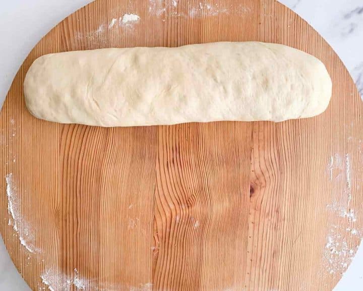 Rolled up dough filled with cinnamon sugar, butter and chopped peaches.