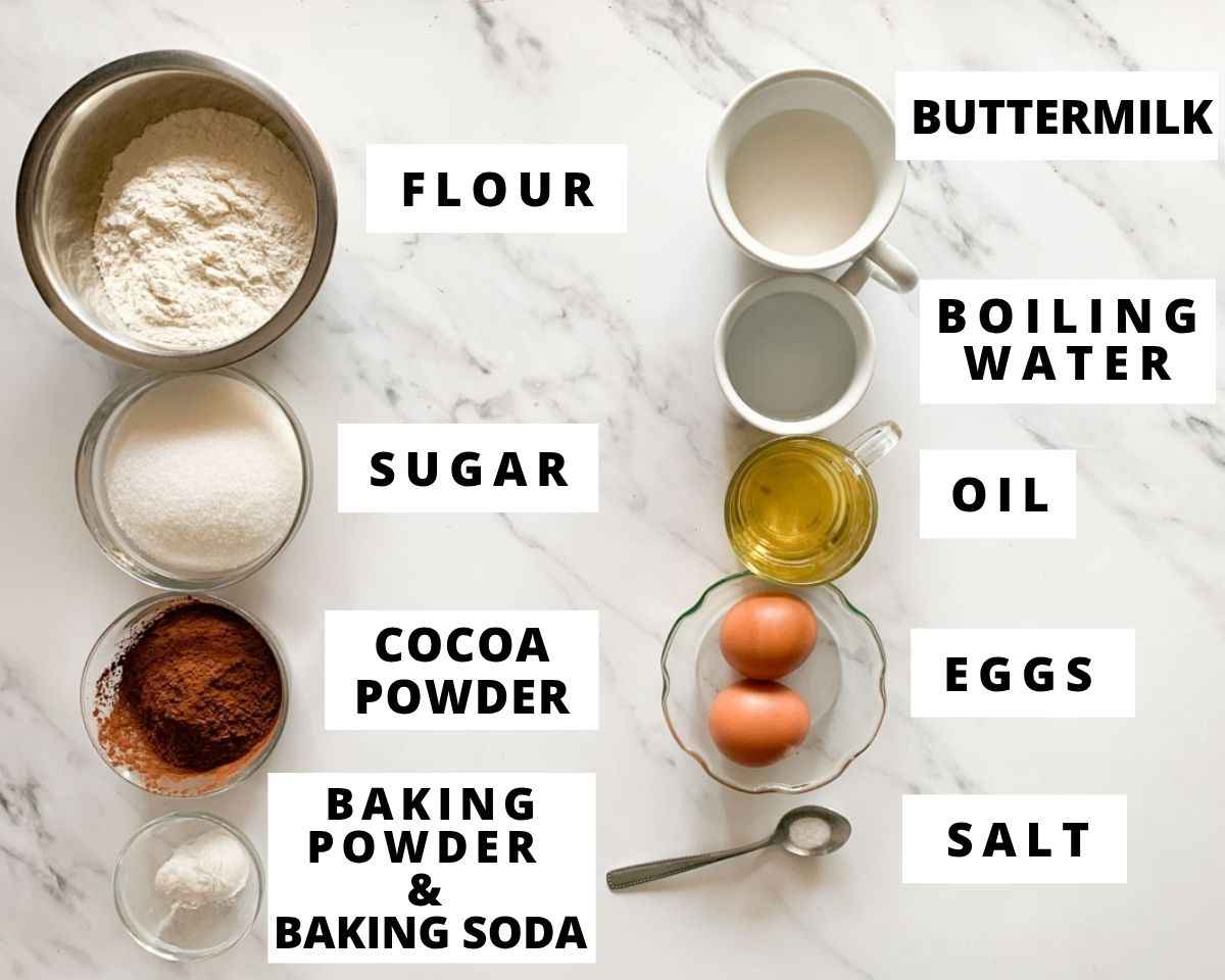 Labeled ingredients for chocolate cake including flour, sugar, cocoa powder, eggs, oil, and buttermilk.