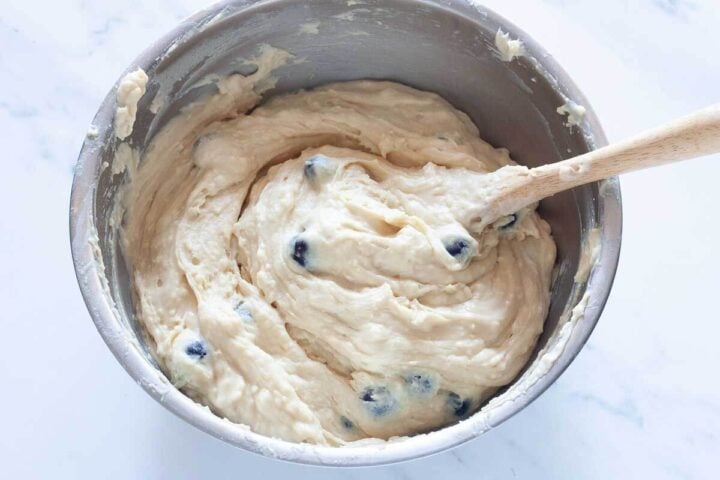 Greek yogurt muffin batter with blueberries folded in.