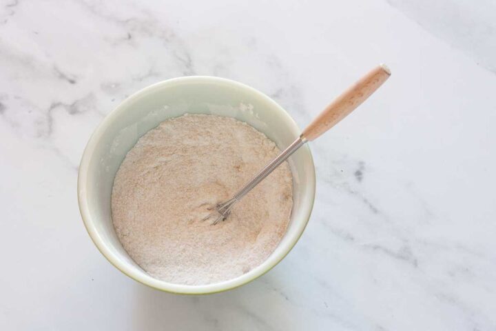 Cornstarch, sugar, salt, and brown sugar whisked together for pie filling.