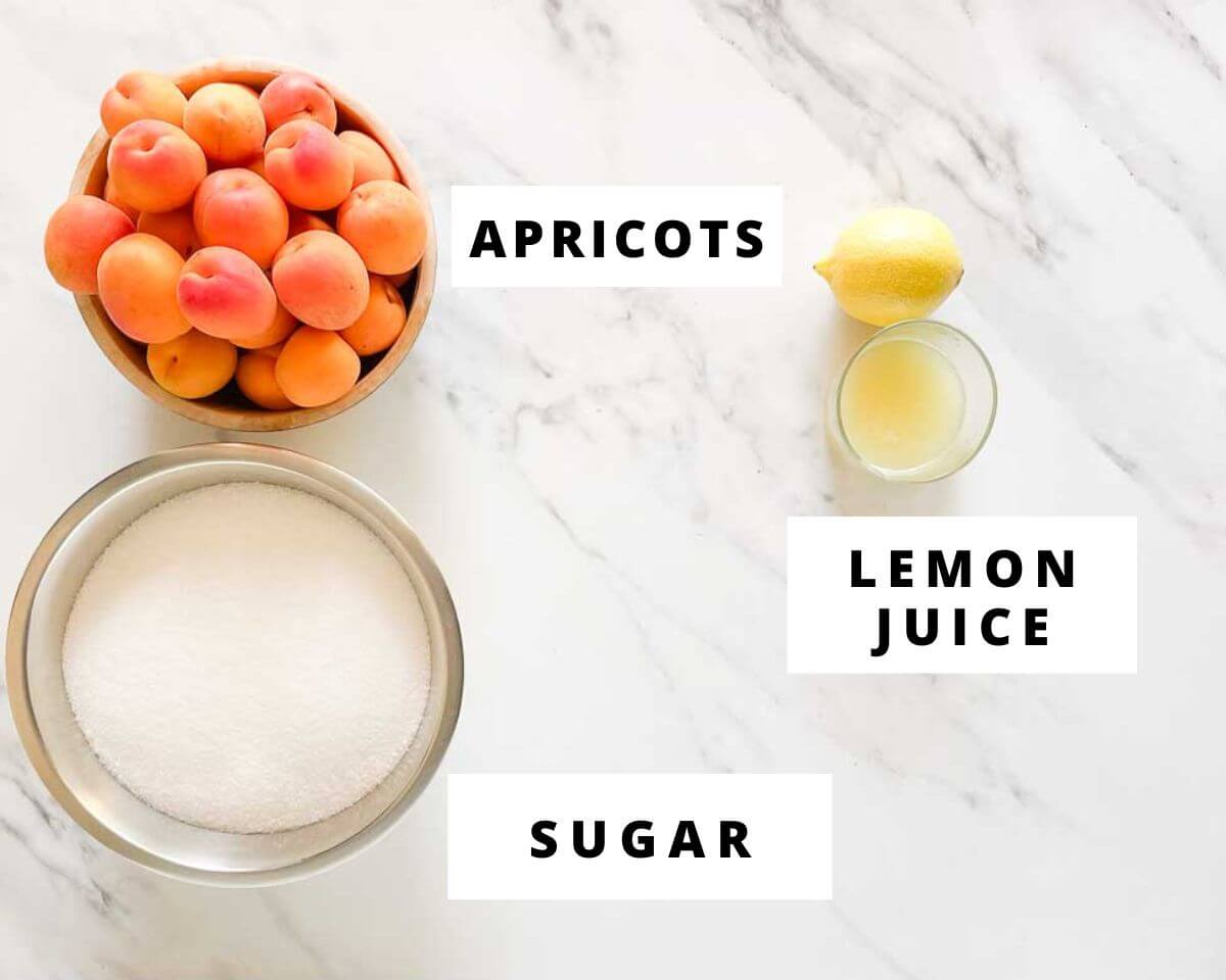Ingredients for apricot jam without pectin, including fresh apricots, sugar, and lemon juice.