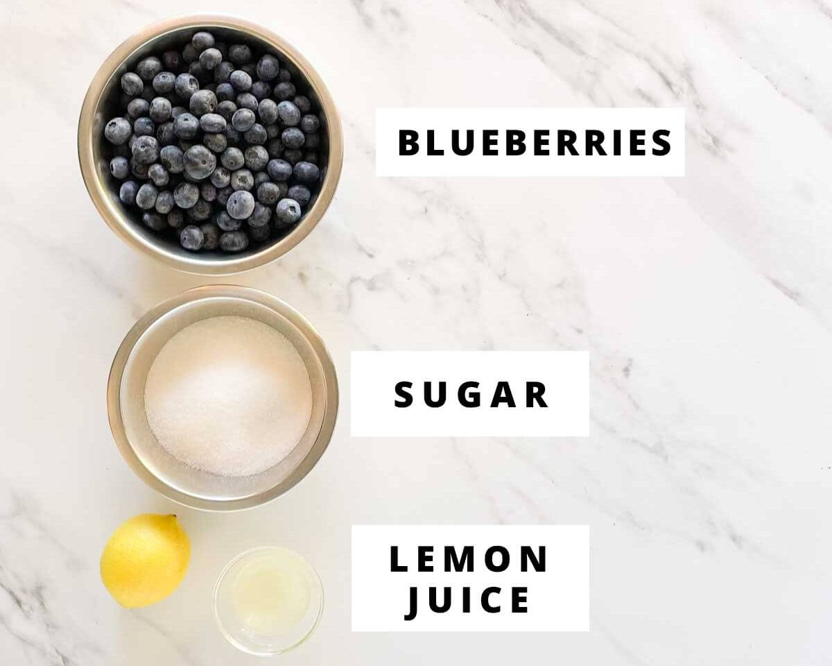 Blueberries, granulated sugar, and lemon juice for blueberry jam without pectin.